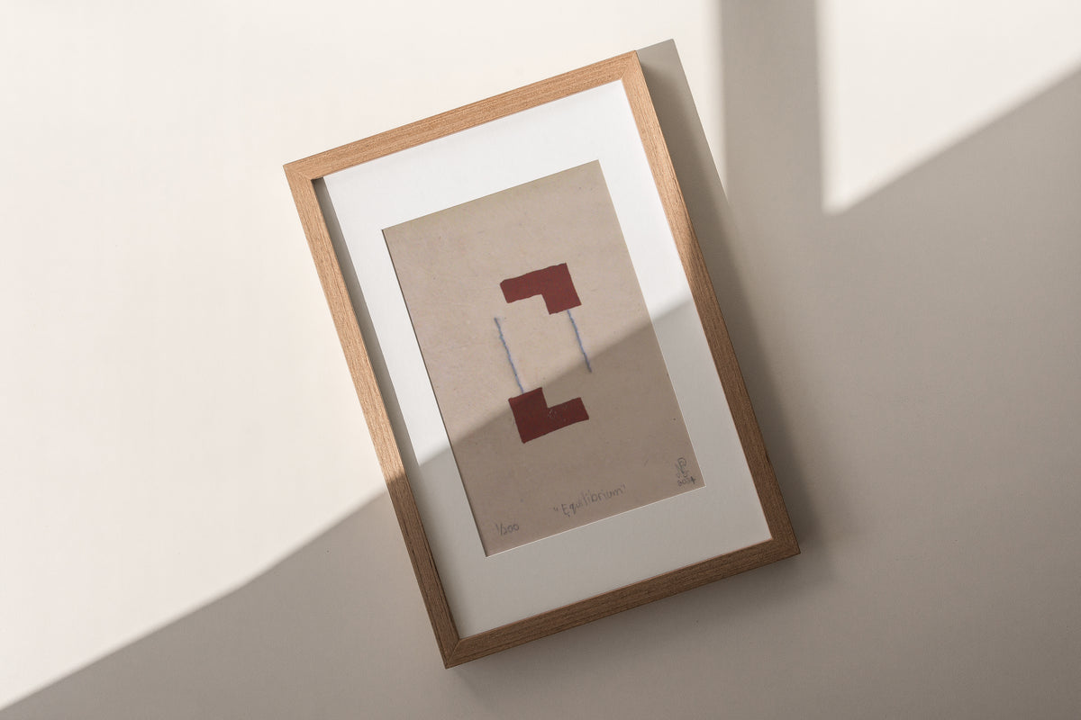 The Adorned framed and hand stitched block printed artwork called Equilibrium Terracotta with shadow across image