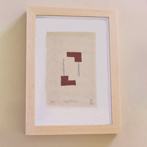 The Adorned framed and hand stitched block printed artwork called Equilibrium Terracotta