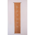 Naturally dyed cotton wall tapestry with hand embroidered shells 