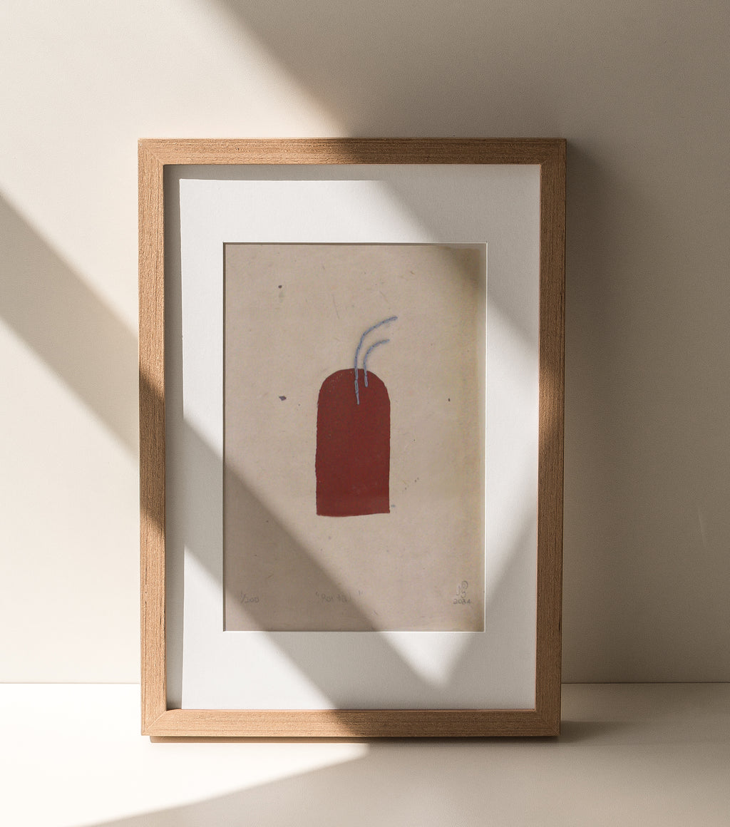 The Adorned framed and hand stitched block printed artwork called The Portal with shadows across frame