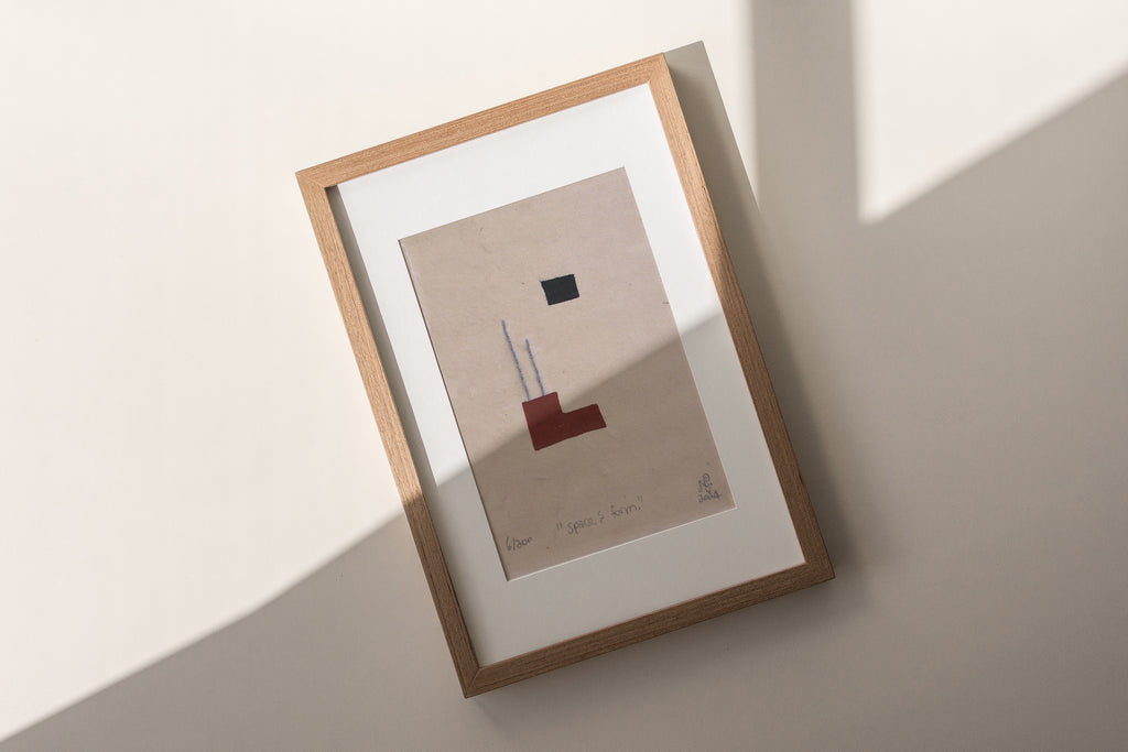 The Adorned framed and hand stitched block printed artwork called Space and Form with shadow across image