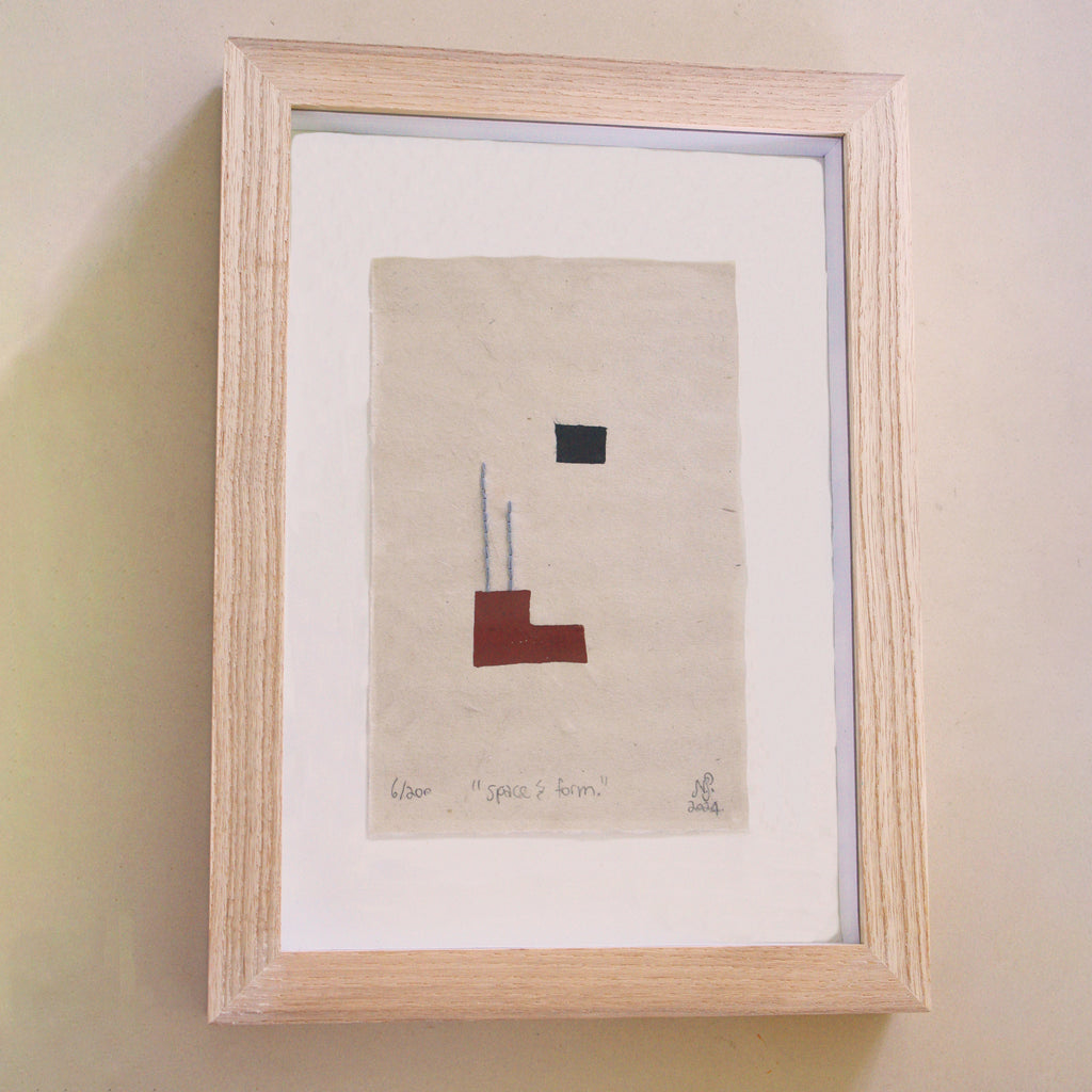 The Adorned framed and hand stitched block printed artwork called Space and Form